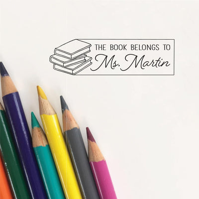 THIS BOOK BELONGS TO SCRIPT TEACHER STAMP WITH BOOK ILLUSTRATION | HEIRLOOM SEALS