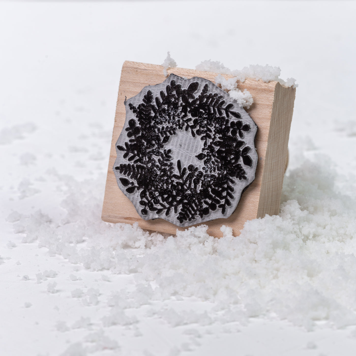 3D wreath wooden rubber stamp in the snow | Heirloom Seals