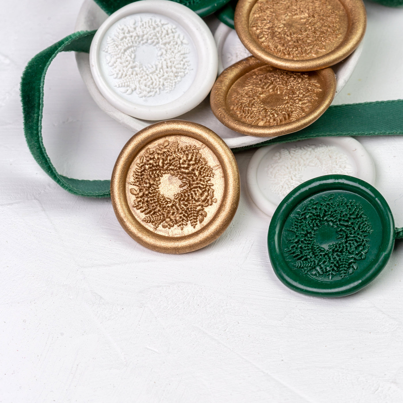 Self-adhesive Christmas wreath wax seal sticker display in gold, green and white | Heirloom Seals