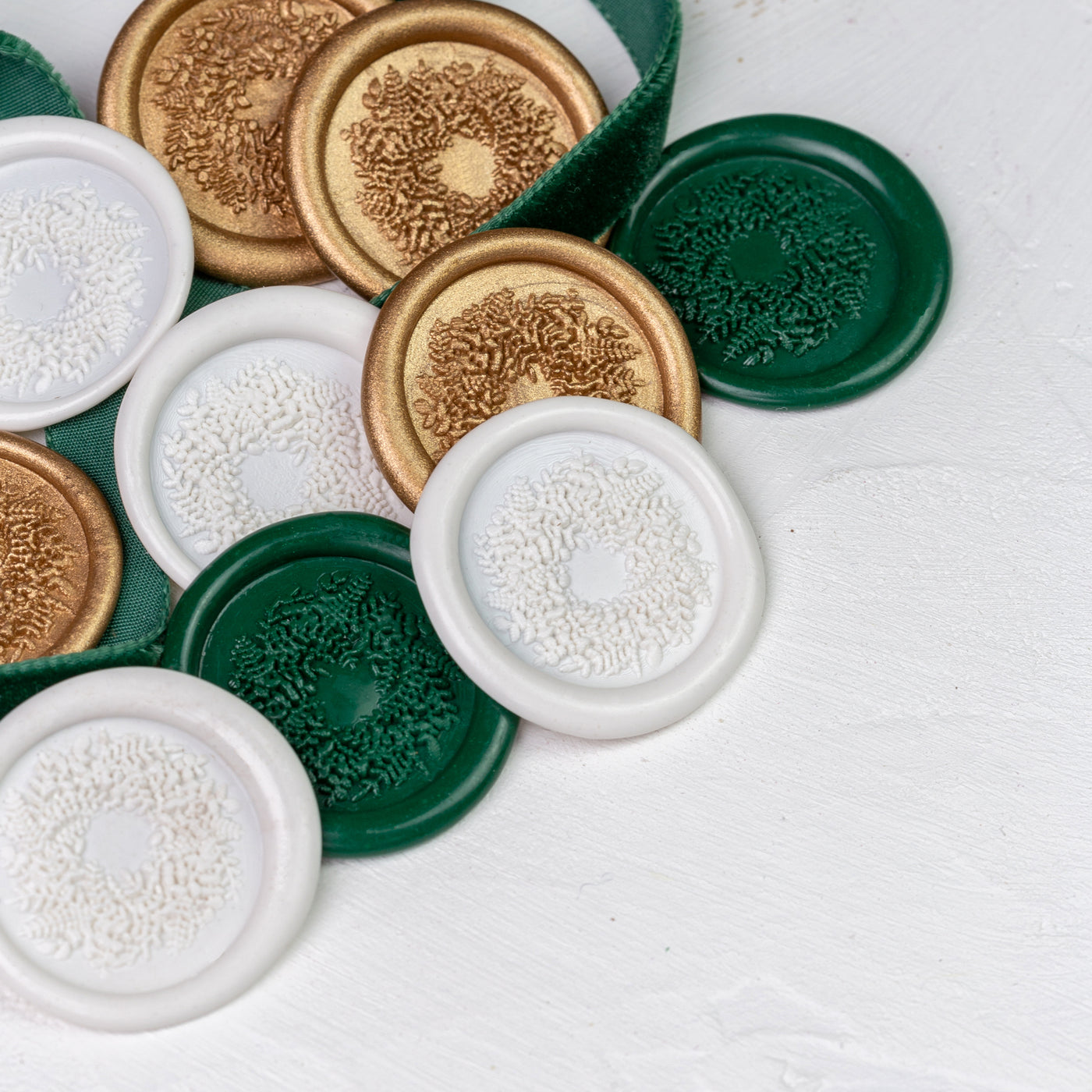 3D Christmas wreath wax seals in white, green and gold | Heirloom Seals