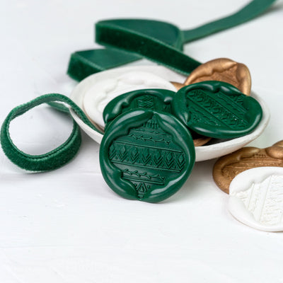 Hand-pressed green, white and gold Christmas bauble wax seal and ribbon display | Heirloom Seals